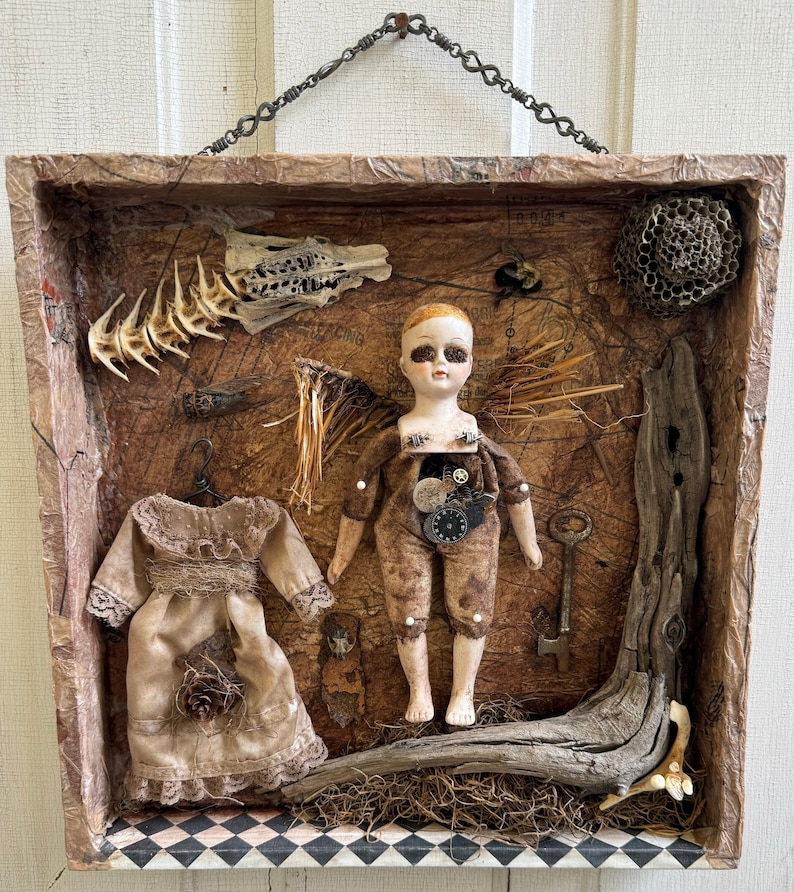 Collecta Morte. An assemblage featuring:vintage porcelain doll,driftwood,found objects,wasp's nest,preserved bee cicada found animal bones. image 1