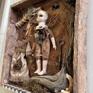 Collecta Morte. An assemblage featuring:vintage porcelain doll,driftwood,found objects,wasp's nest,preserved bee cicada found animal bones. image 3