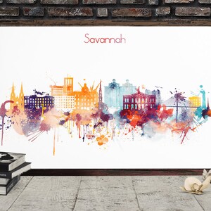 May include: A watercolor painting of the Savannah, Georgia skyline. The painting features a variety of buildings, including churches, skyscrapers, and bridges. The painting is done in a variety of colors, including blue, green, orange, and red. The painting is set against a white background.