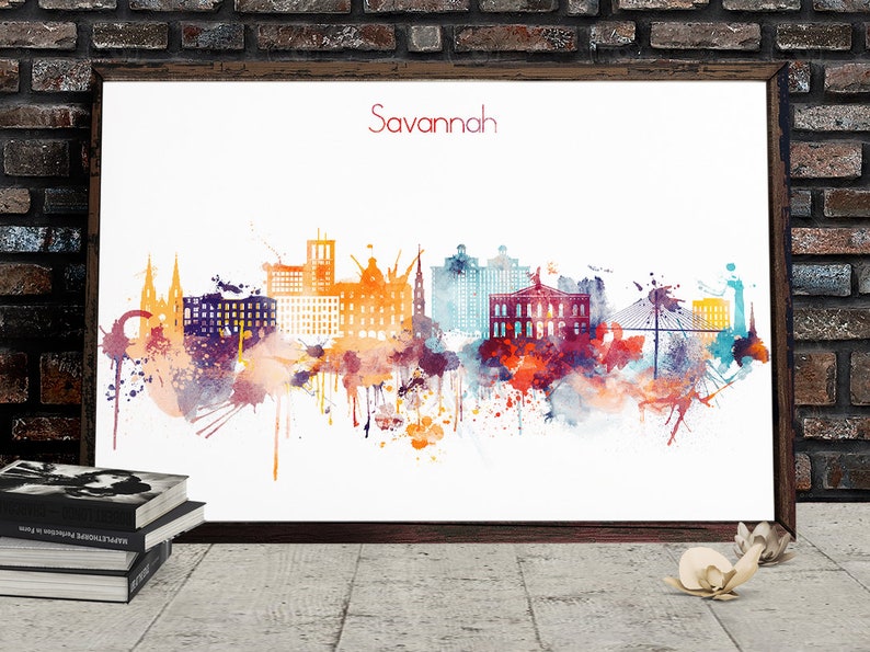 May include: A watercolor painting of the Savannah, Georgia skyline. The painting features a variety of buildings, including churches, skyscrapers, and bridges. The painting is done in a variety of colors, including blue, green, orange, and red. The painting is set against a white background.
