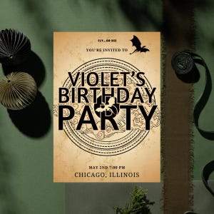May include: A vintage-style party invitation with a black and white illustration of a dragon and the text "FLY...OR DIE", "YOU'RE INVITED TO", "VIOLET'S BIRTHDAY PARTY", "MAY 2ND 7:00 PM", and "CHICAGO, ILLINOIS".