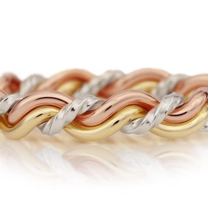 Cord of Three™ Rings. Braided Christian Wedding Rings. (Solid 18k yellow gold, 14k rose gold and platinum used) By Todd Alan