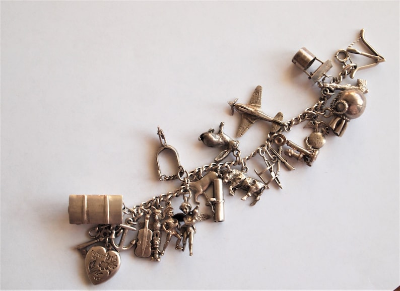 Charm Bracelet Sterling Silver 22 Charms Puffy Heart Vintage 1940s Cherub Diploma Tojan Totem Pole Cupid Moveable Mechanical