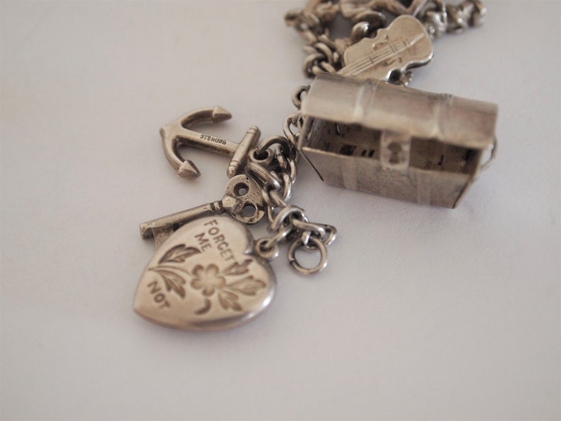 Charm Bracelet Sterling Silver 22 Charms Puffy Heart Vintage 1940s Cherub Diploma Tojan Totem Pole Cupid Moveable Mechanical