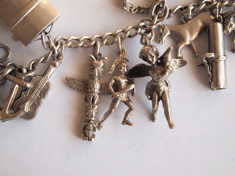 Charm Bracelet Sterling Silver 22 Charms Puffy Heart Vintage 1940s Cherub Diploma Tojan Totem Pole Cupid Moveable Mechanical