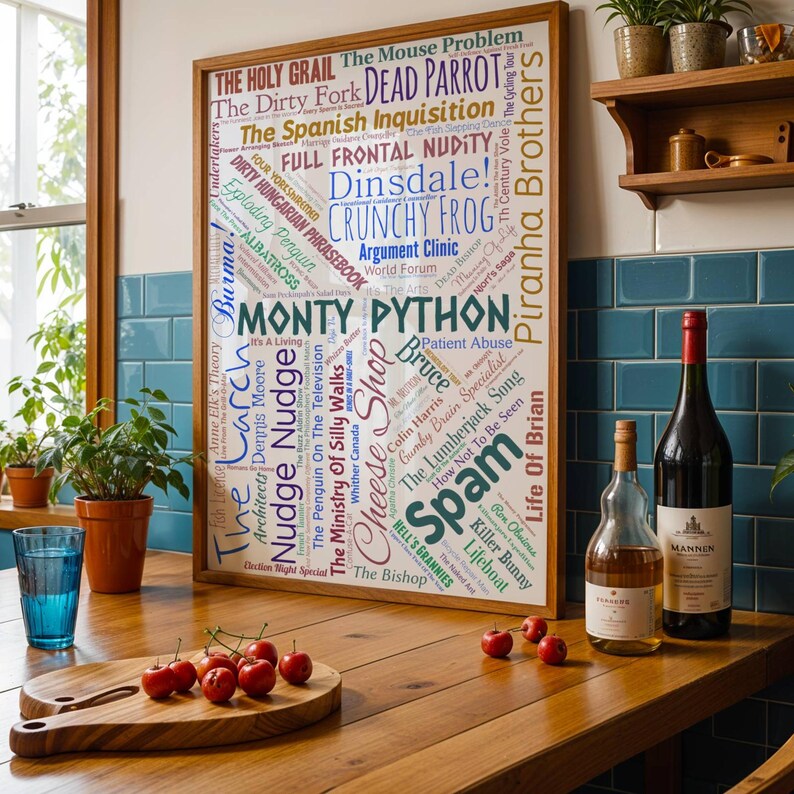 May include: A framed print with a word cloud of Monty Python references. It's on a wooden table with cherries, a glass of water, and wine bottles. The print is approximately 76 cm x 102 cm.