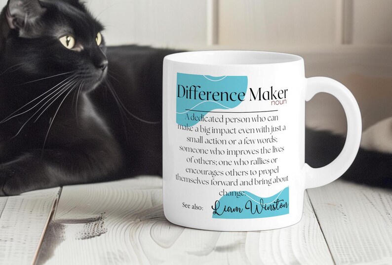 May include: White ceramic mug with a blue and white design. The mug features the text "Difference Maker" with a definition and the name "Liam Winston".