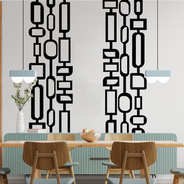 May include: A dining room with a light blue wall and a wooden table with four chairs. The wall features a black geometric design with abstract shapes.