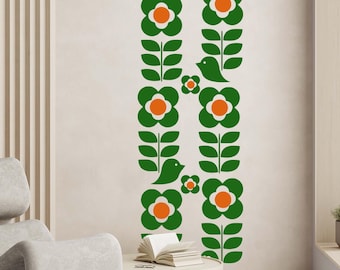 May include: A wall decal featuring a repeating pattern of green flowers with orange centers, green leaves, and green birds. The design is set against a neutral-colored wall, creating a vibrant and eye-catching display. A modern, minimalist design.