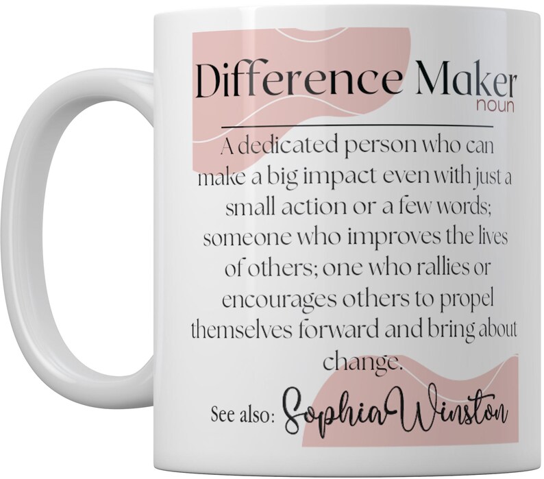 May include: White ceramic mug with a pink and white design. The mug features the text "Difference Maker" with a definition and the name "Sophia Winston".