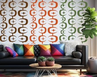 May include: A living room with a black leather sofa and colorful throw pillows. The wall behind the sofa is decorated with a geometric pattern in brown, orange, and green.