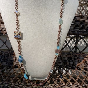 Over the head necklace store