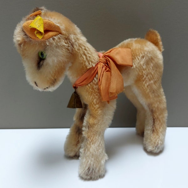 Vintage Steiff goat, "Zicky", collectible, ringing brass bell, sateen ribbon, green eyes, mohair, signature silver tab, made in Germany.