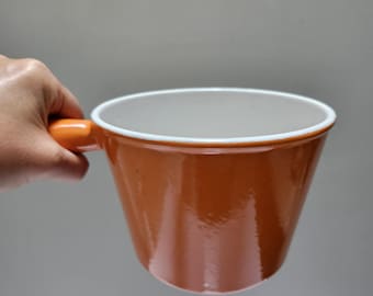 Le Creuset orange fondue pot, cast iron sauce pot