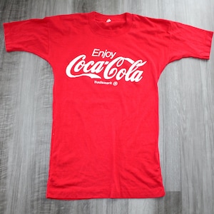 Vintage 80s 90s Clothing Coca Cola Coke Soda Brand Screen Stars Men Size Small Retro Enjoy Spell Out Logo Bottle Print Short Sleeve T Shirt