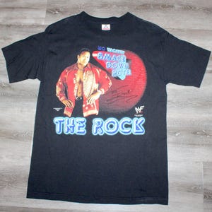 Vintage 90s Clothing Pro Wrestling WWF WWE Dwayne Johnson the Rock Men Size Medium Retro 1999 2000 Smackdown Hotel Short Sleeve T Shirt