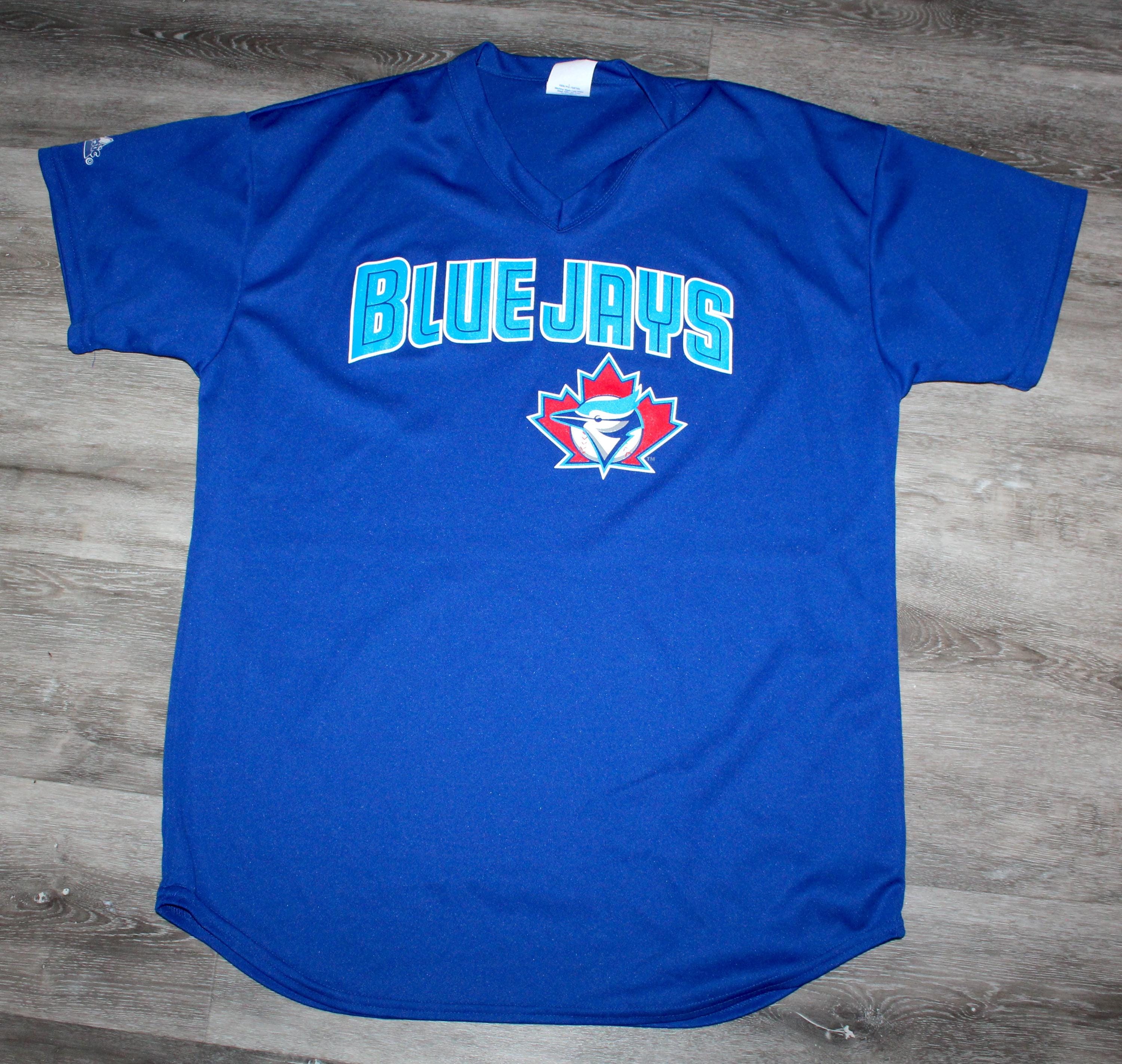Vintage 90s Clothing MLB Toronto Blue Jays Baseball Canada Men Size XL / Oversized Womens Retro Logo Print Short Sleeve Jersey T Shirt