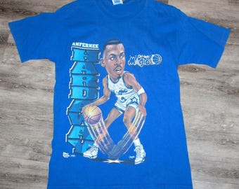 Vintage 90er Jahre Kleidung NBA Rolando Magic Basketball Anfernee Penny Hardaway Pro Player Männer Größe Medium Karikatur Print Kurzarm T-Shirt