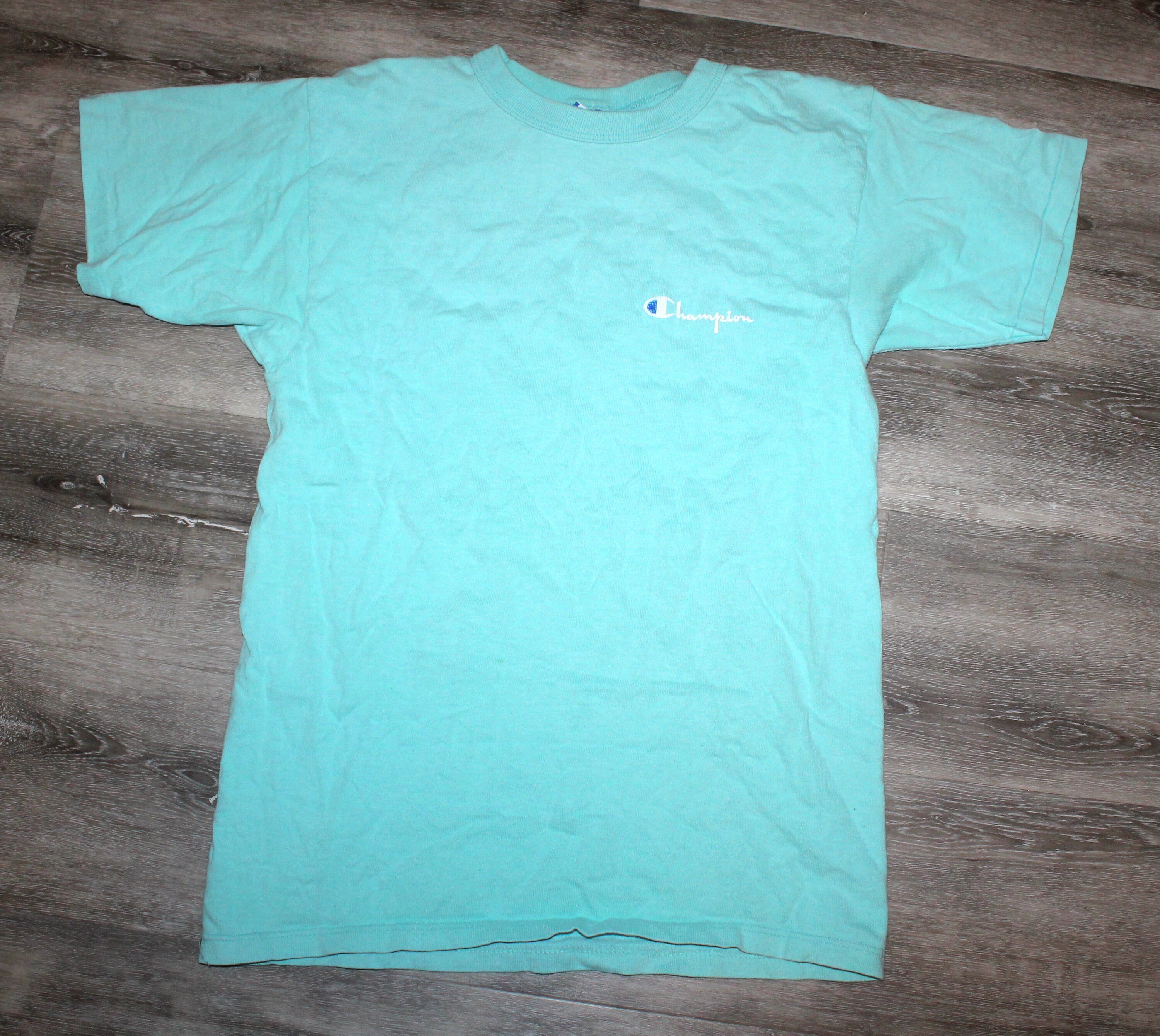 Teal champion clearance shirt