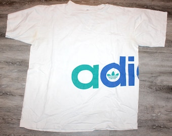 Vintage 80s 90s Clothing Adidas Sportswear Men Size Large / Oversized Retro 3 Stripes Trefoil Logo Wrap Around Print Short Sleeve T Shirt