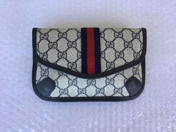 80s Vintage Gucci brown toiletary clutch pouch with all over horsebit –  eNdApPi ***where you can find your favorite designer  vintages..authentic, affordable, and lovable.