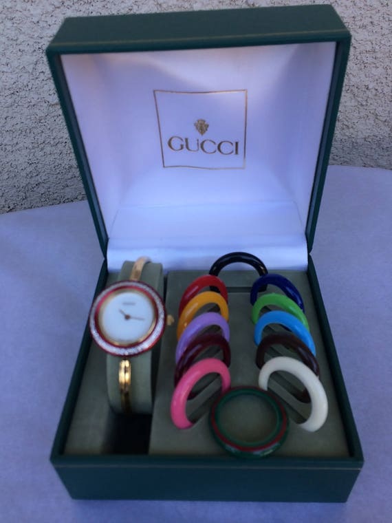 gucci watch with interchangeable bezels