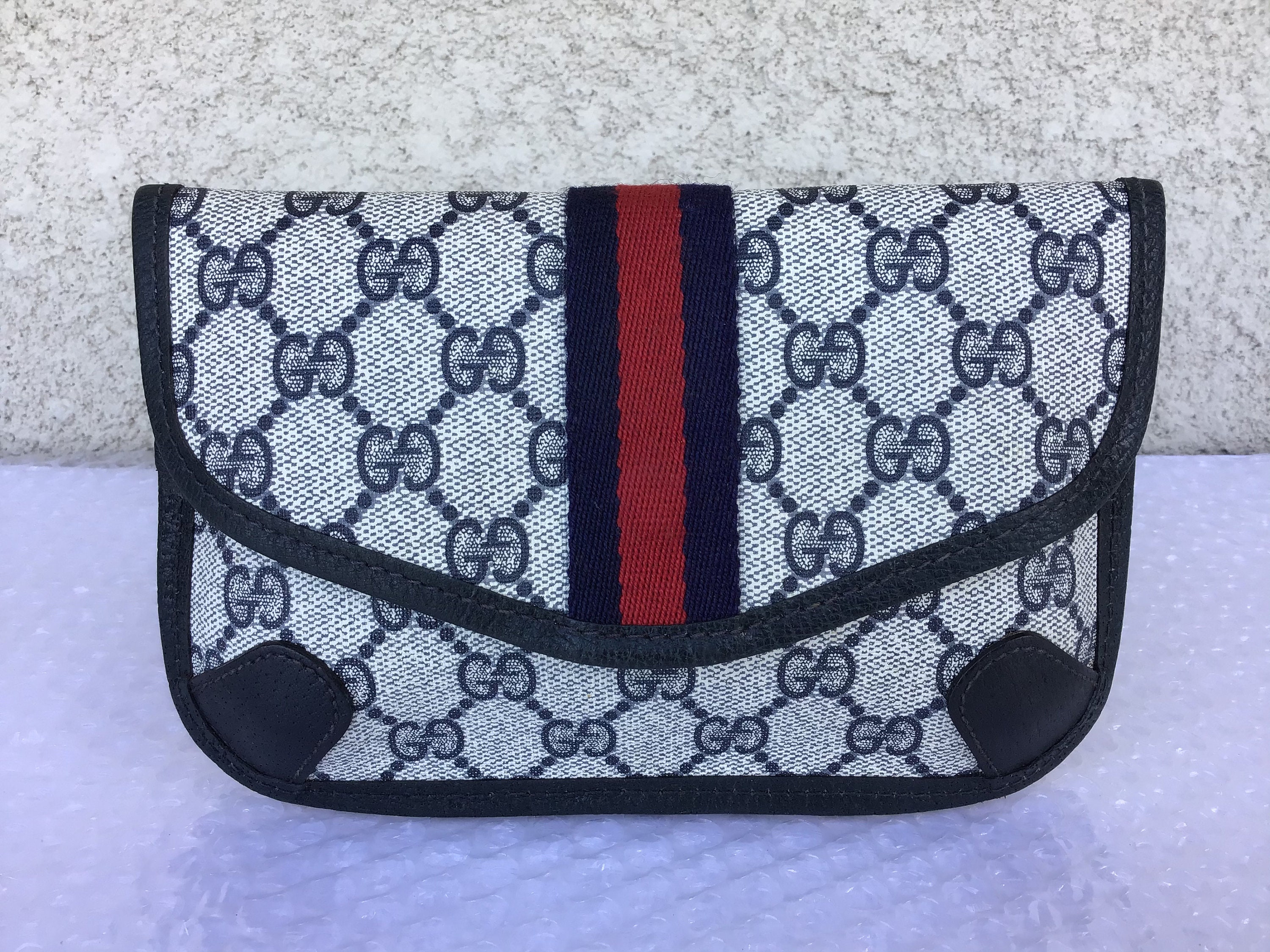 Sold at Auction: Vintage Gucci Navy Blue Clutch or Cosmetic Bag