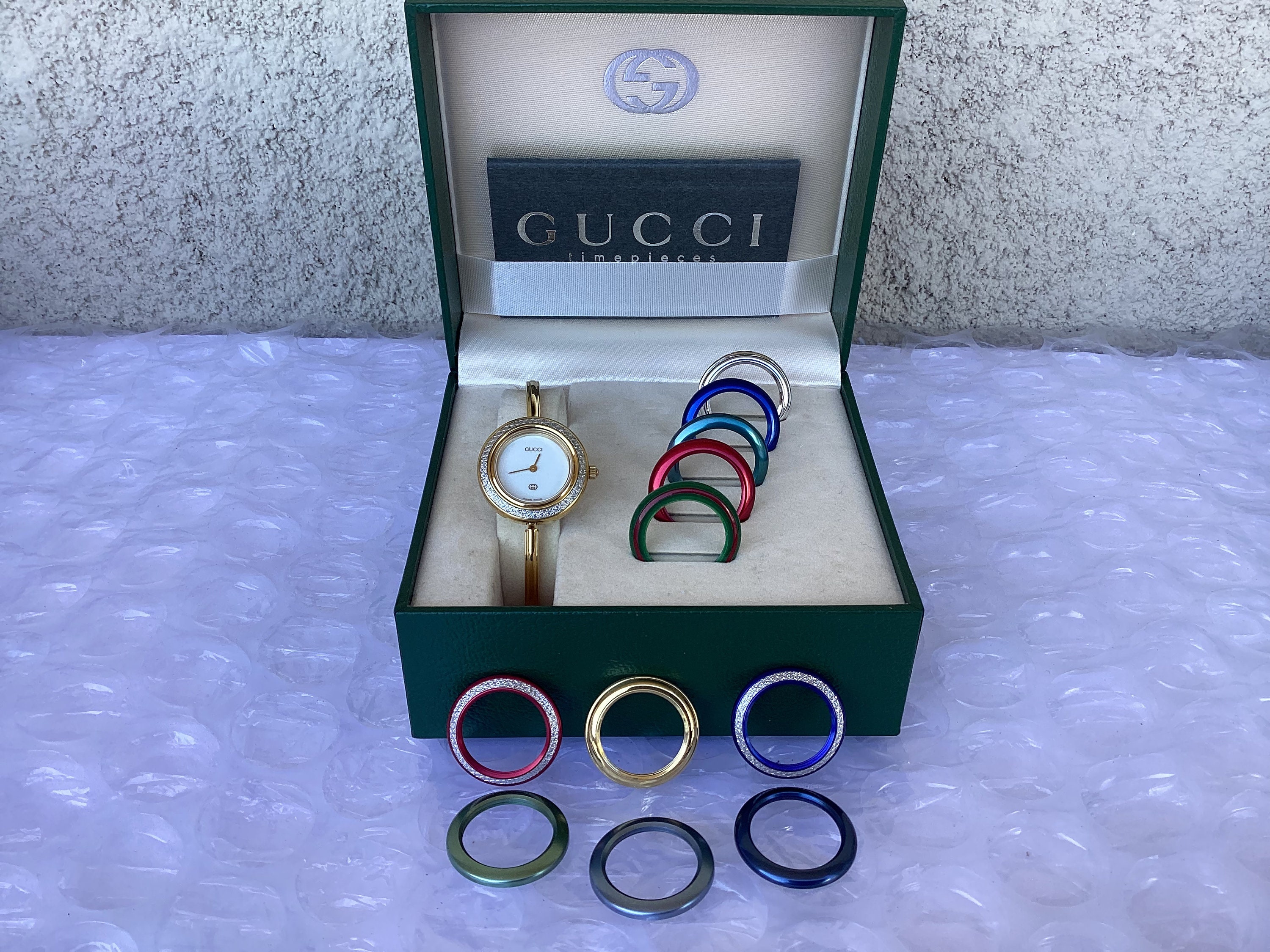 Gucci bangle watch with interchangeable rings sale