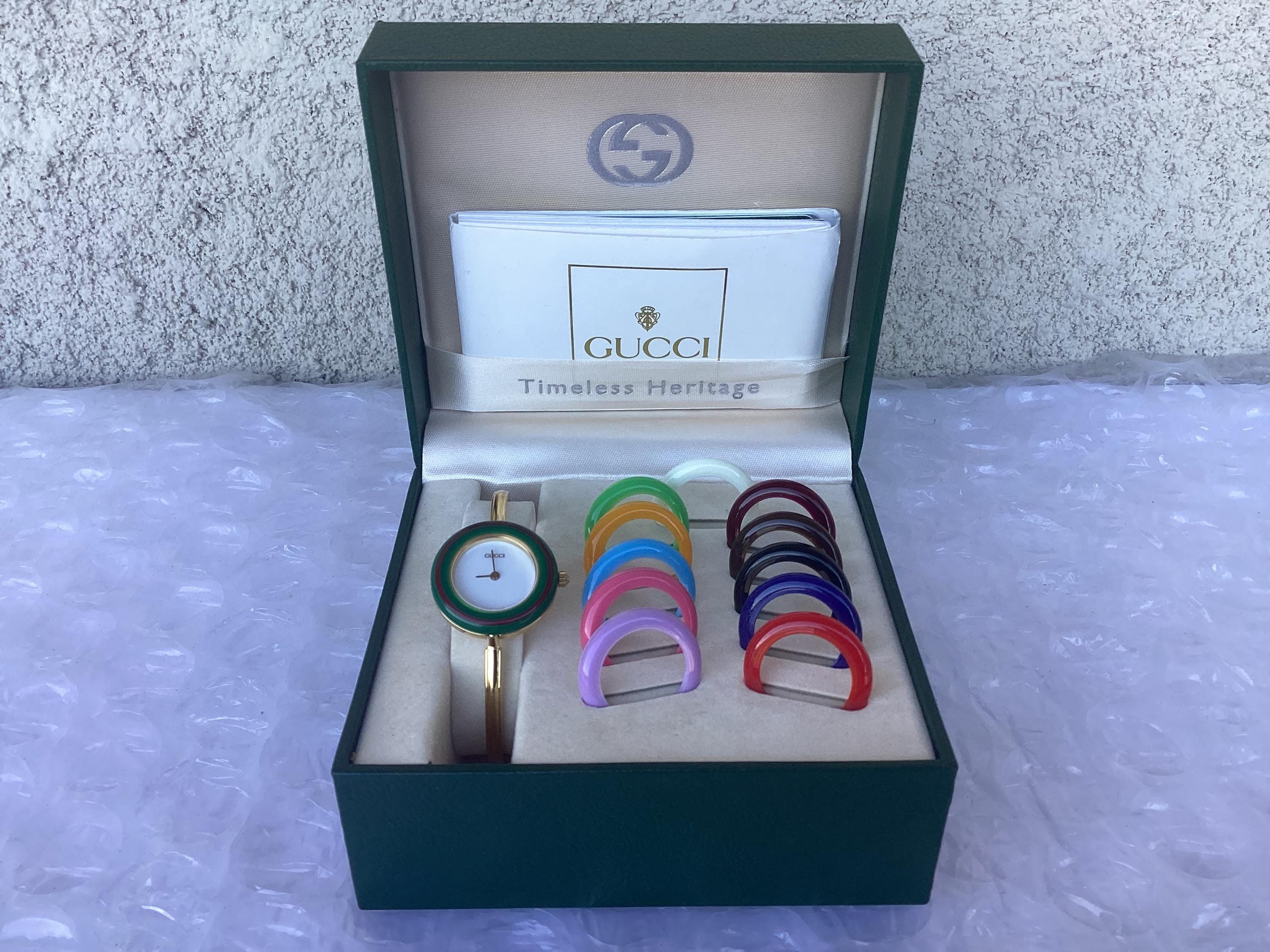 Gucci 11 12.2 Change Bezel Bangle Watch M Quartz SOLD] Rare Gucci 11/12.2 Change Bezel Gold Bangle Watch (5  main image 2