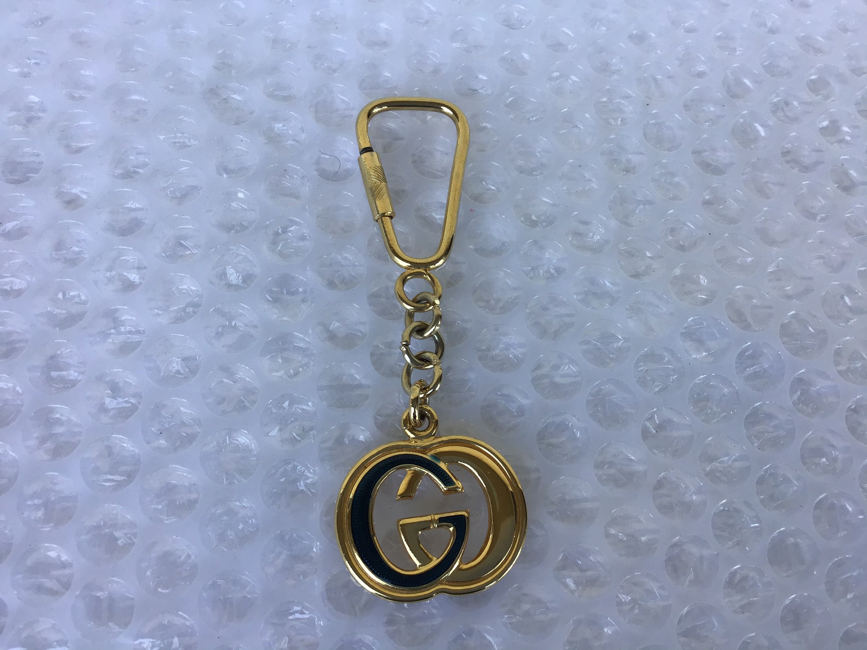 Vintage Gucci Gold Tone Enameled GG Keychains Unisex Good Vintage Gucci Gold Tone Enameled GG Keychains Unisex Good