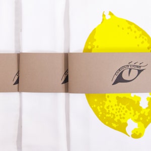 Lemon set of three panama cotton tea towels: two screen printed and one blank. Designed by Curious Lions and made in the UK.