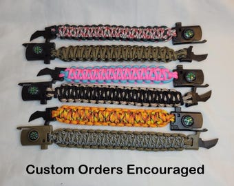 May include: Six different paracord bracelets with compass and bottle opener attachments. The bracelets are in various colors and patterns, including black, green, orange, pink, and white. Custom orders encouraged.