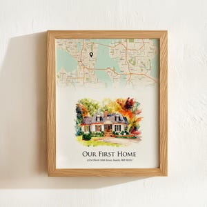 May include: Framed print featuring a watercolor illustration of a house with a map overlay. The artwork is in a light oak frame. The text "OUR FIRST HOME" is displayed below the house illustration, along with the address.