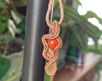 Wire Wrapped Orange Agate Sphere “Murdo”