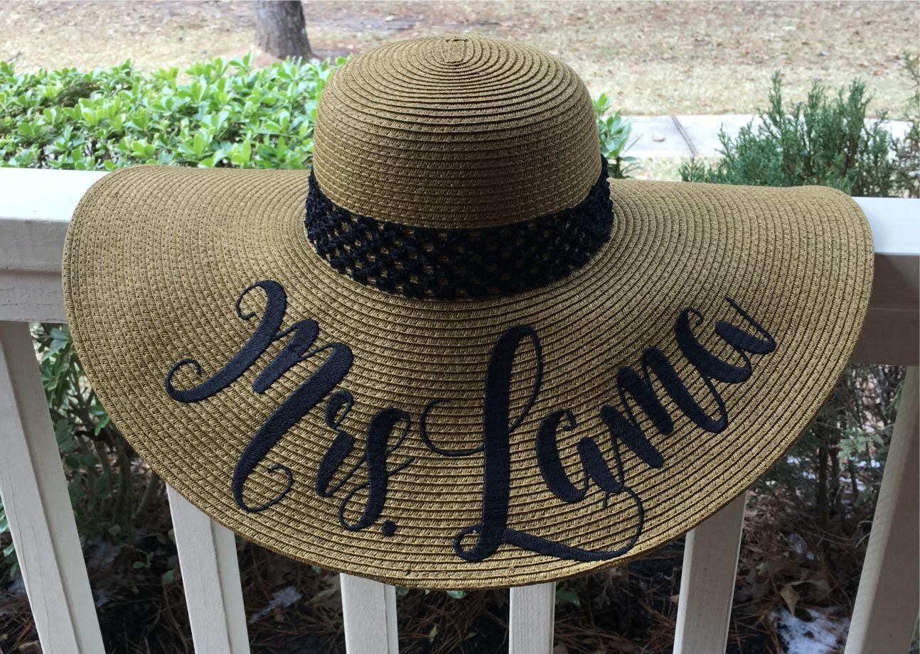 white floppy hat wedding