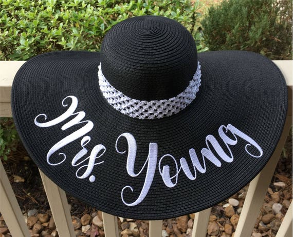 white floppy hat wedding