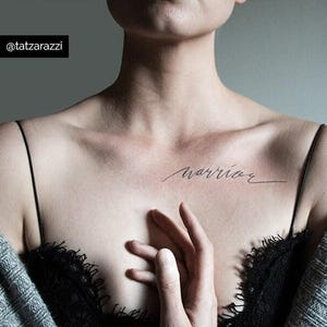 Warrior large temporary tattoo script calligraphy cursive flowing text black simple minimal hipster original brave fighter strong