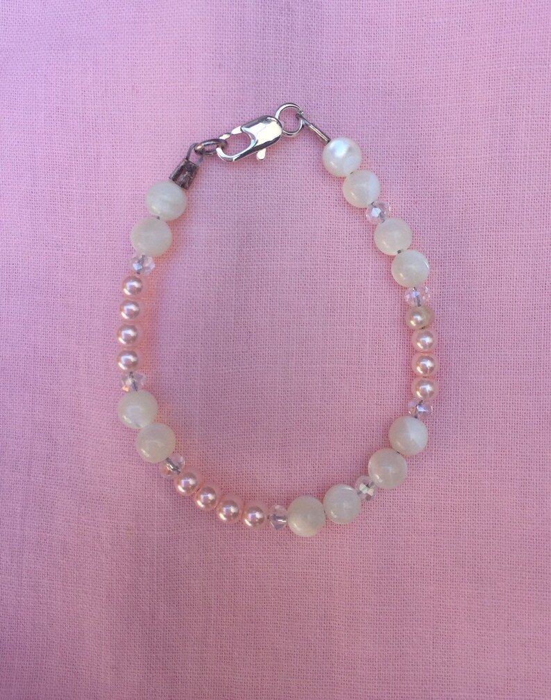 Handmade Vintage Pink Baby Sunsuit With A Handmade Beaded Baby Bracelet