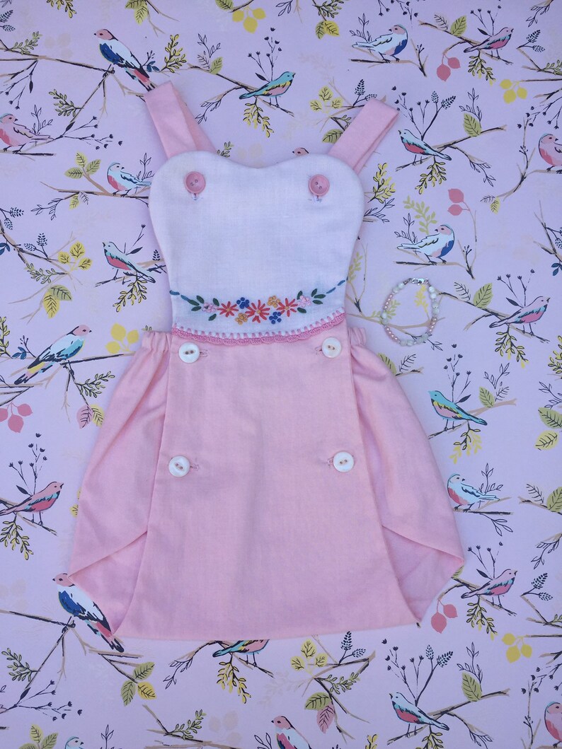 Handmade Vintage Pink Baby Sunsuit With A Handmade Beaded Baby Bracelet