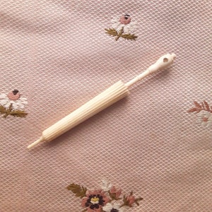 Antique bone needle case with Stanhope Victorian needle case
