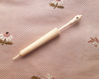 Antique bone needle case with Stanhope Victorian needle case