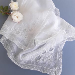 Antique embroidered handkerchief with lace trim and fine drawn thread work. 19 th century whitework embroidery