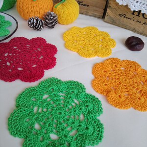 Set of four colorful crocheted vintage cotton coasters, for hot and cold beverages