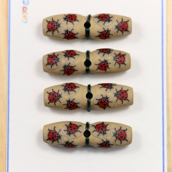 Pack de 4 bascules de 36 mm de long avec des coccinelles.  Coccinelle Coccinelle Boutons à bascule en argile polymère.