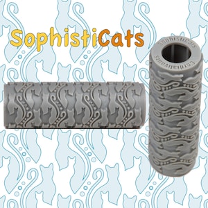 May include: Two grey cylindrical rolling pins with cat patterns. One pin shows a repeating pattern of cat silhouettes, while the other features a design of stylized leaves and the text "SophistiCats". The background has a light blue cat silhouette pattern.