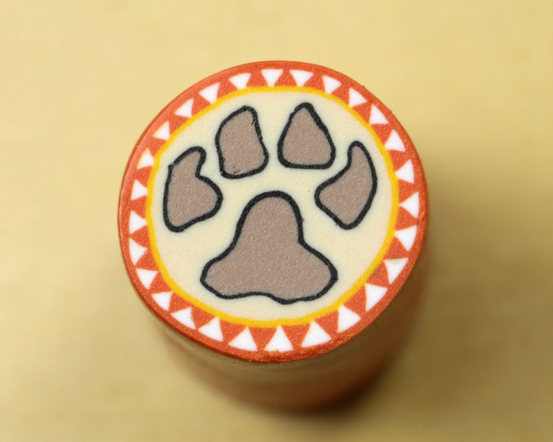 Unbaked Dog Paw Print polymer cane. Raw uncured Puppy Dog Paw Print polymer clay cane