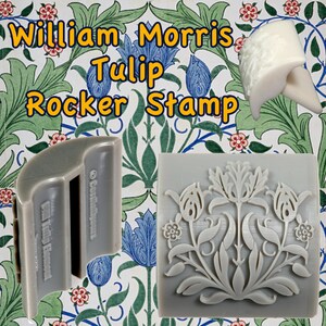 May include: A gray rubber stamp with a floral design featuring tulips and leaves. The stamp is labeled "William Morris Tulip Rocker Stamp".