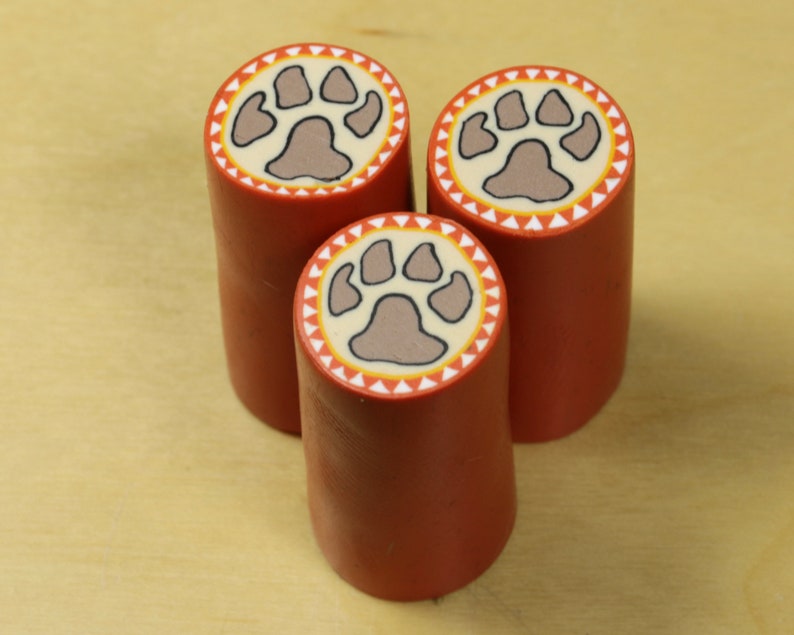 Unbaked Dog Paw Print polymer cane. Raw uncured Puppy Dog Paw Print polymer clay cane