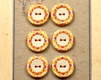 Multi-toned polymer clay buttons with textured centres. 19mm polymer clay buttons with creamy textured pattern inside.