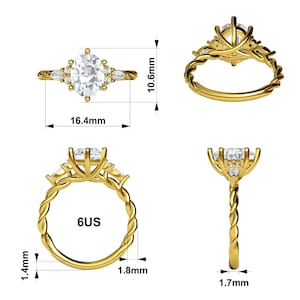 May include: A gold ring with a large oval-cut center stone and smaller accent stones. The ring's band has a twisted design. The ring is 16.4mm long and 10.6mm wide. The ring size is 6US.
